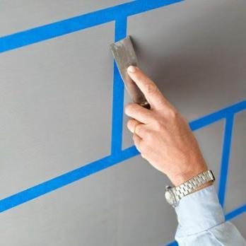Hvordan male en vegg av faux fliser